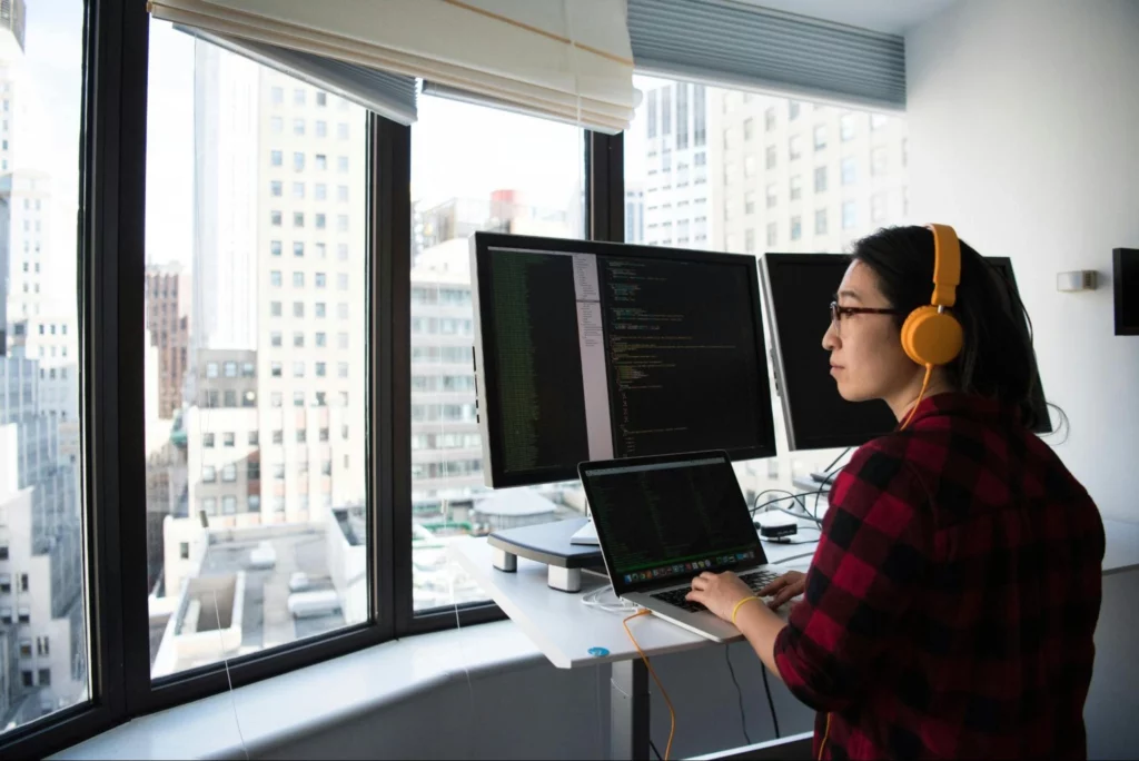 A developer sitting in front of his computer