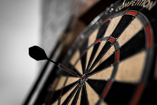 Dart board showing high accuracy and precision in automated claims processing