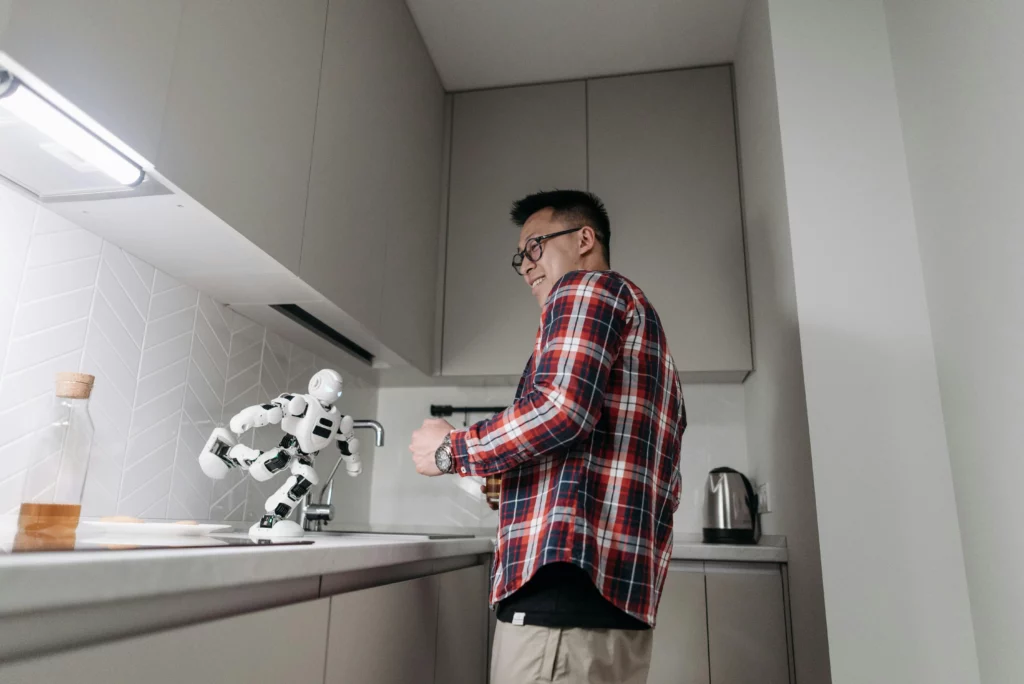 A man working with robot as digital assistant