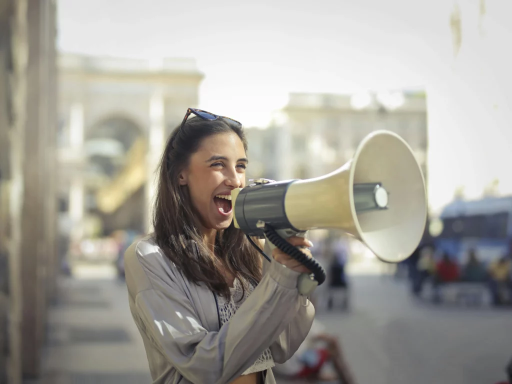 girl messaging through megaphone