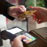 A man paying through his credit card