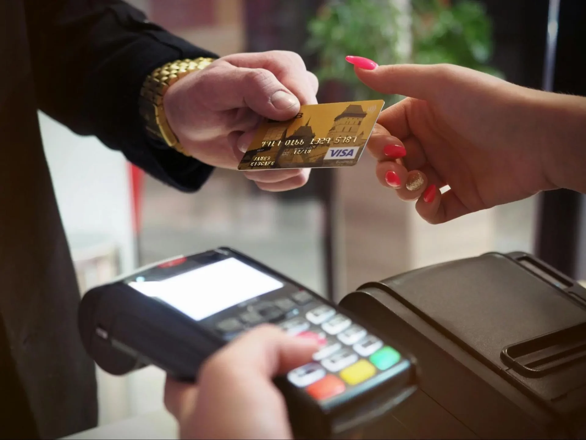 A man paying through his credit card