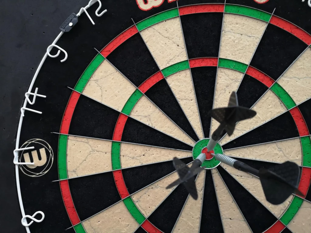 arrows hitting the dart-board