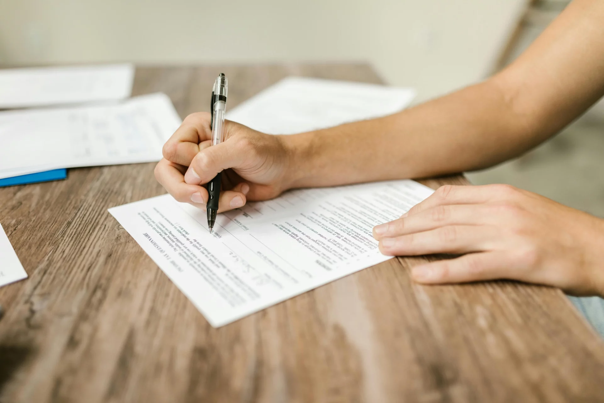 Man filling a form manually