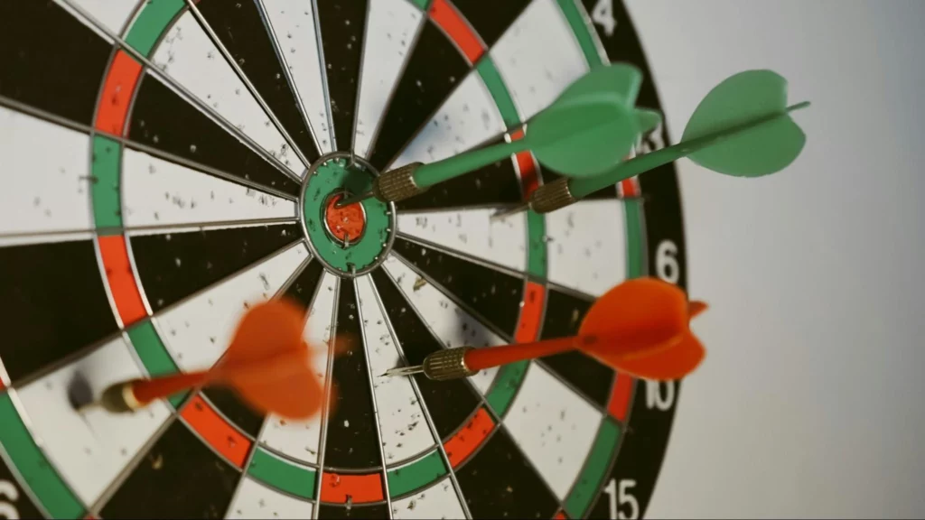 4 darts on a dart board