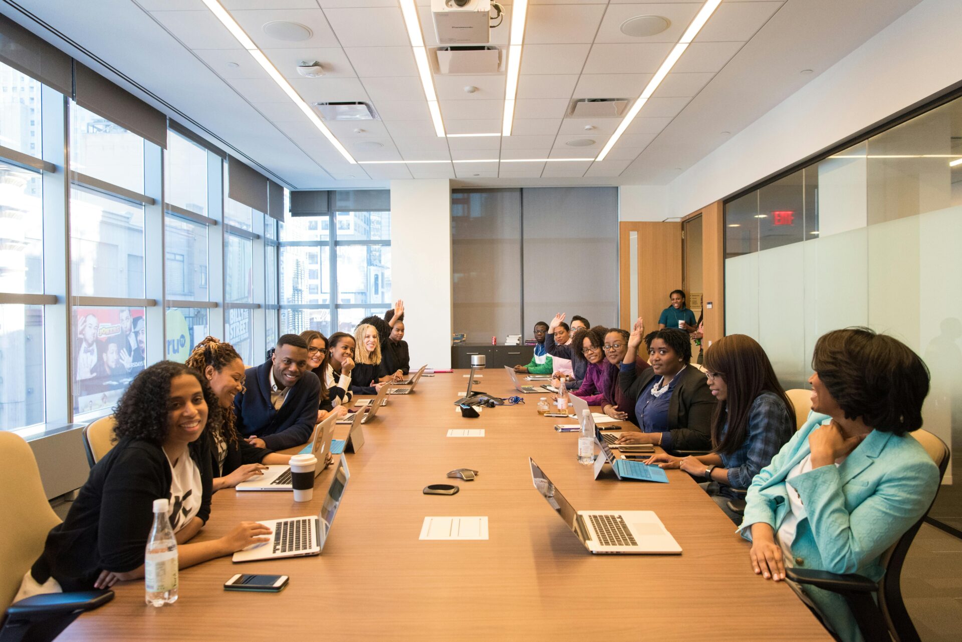 Employees having their business meeting in a conference hall