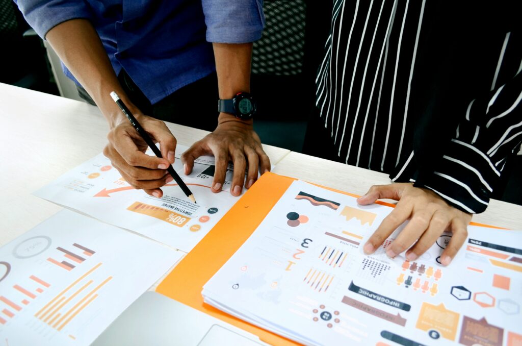 Man underlining the report with pencil