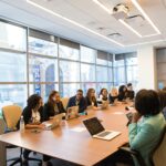 Employees having their meeting in the conference hall