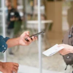 man scanning with his moblie